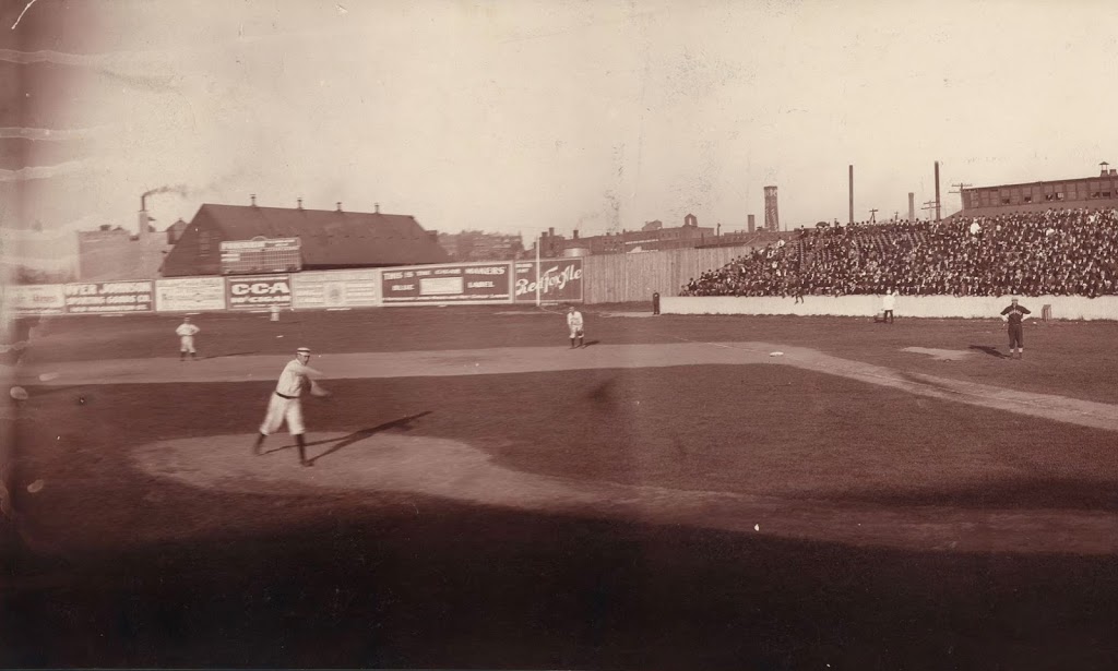 Boston Americans in dugout at the Huntington Avenue Grounds, 1903